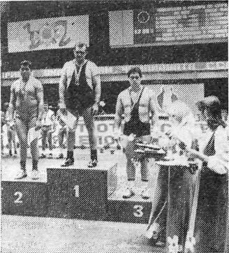 Three prize-winners of the over 90 kg class on the podium